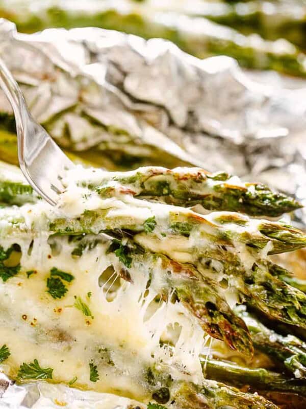Cheesy Asparagus on a fork.