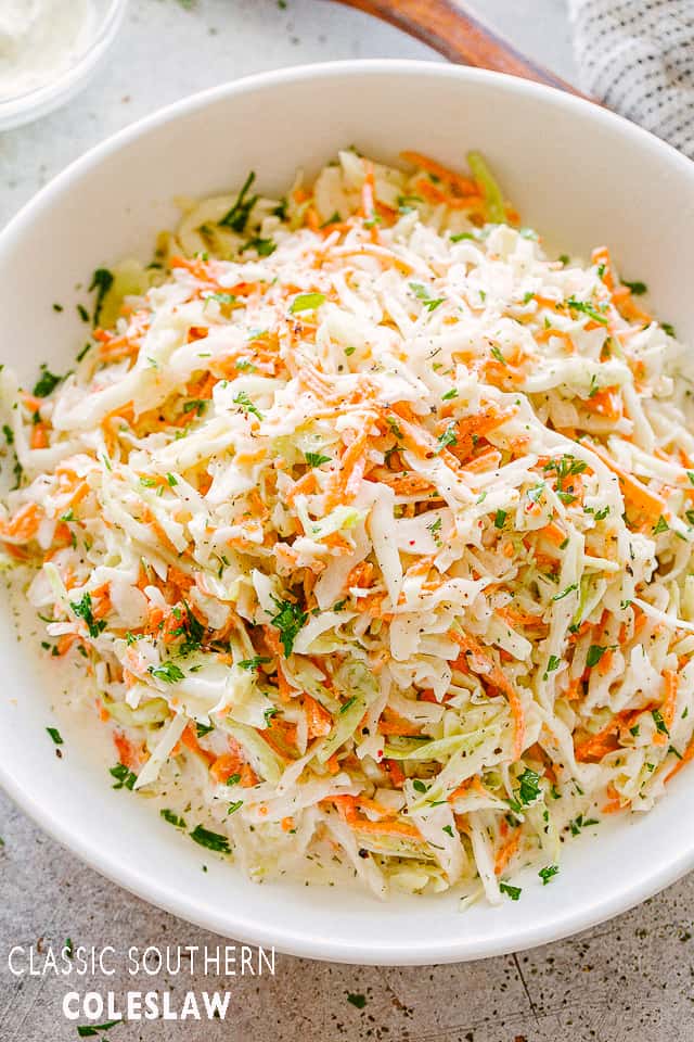 Coleslaw in a white salad bowl.