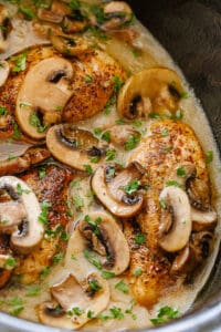 Slow Cooker Chicken Marsala in creamy sauce with mushrooms.