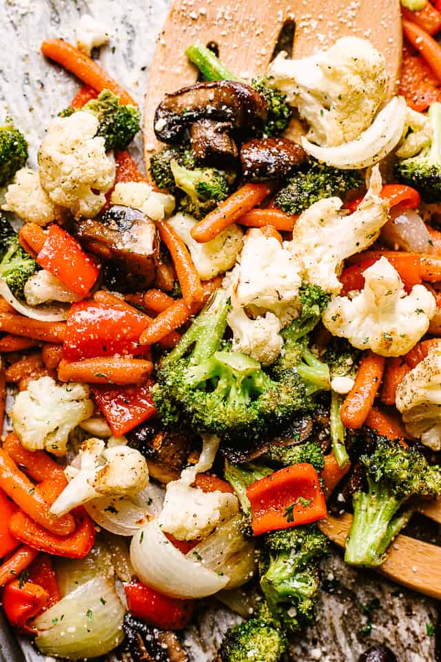 Oven roasted vegetables on a sheet pan.