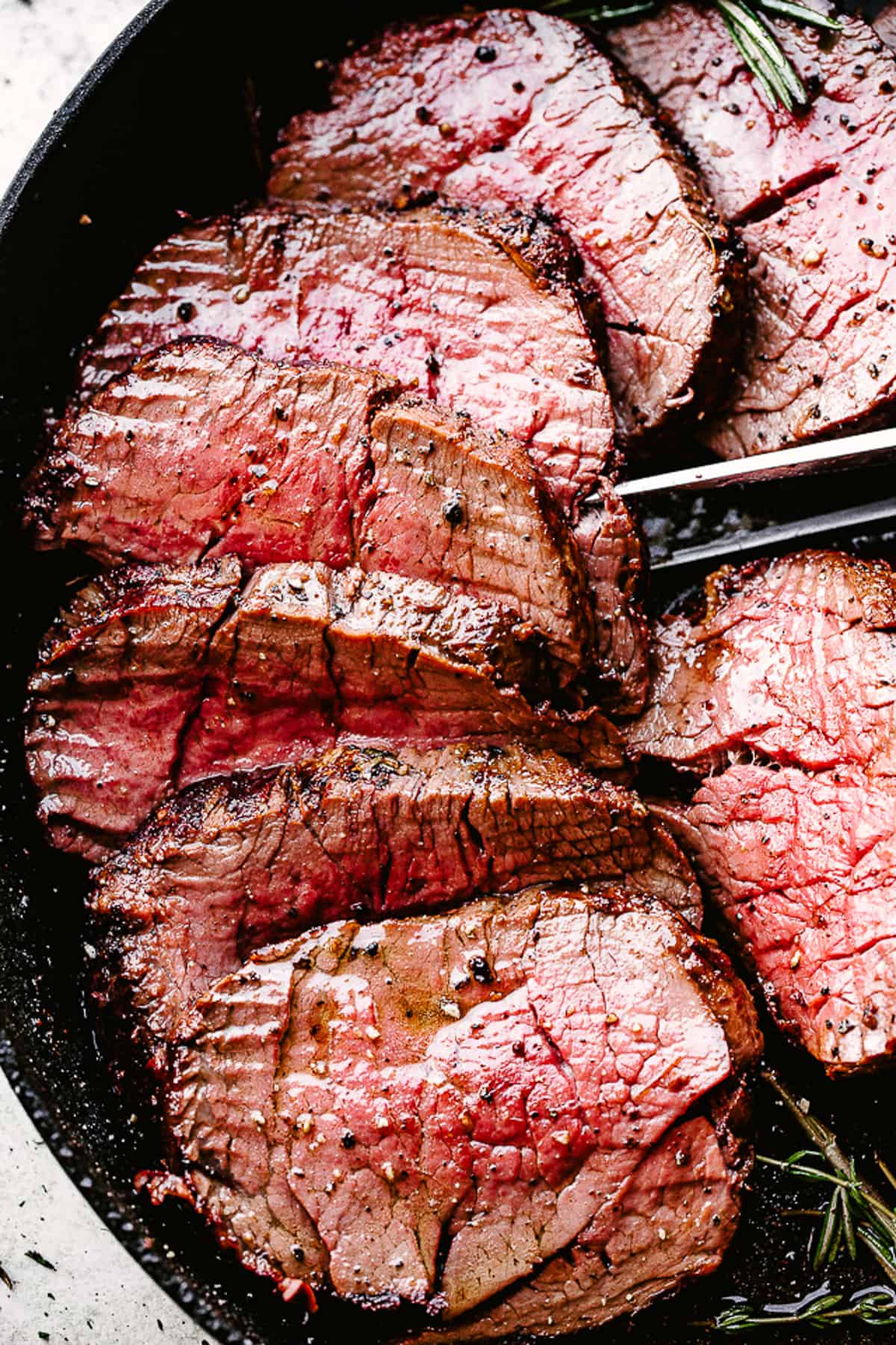 Cooked Beef tenderloin slices.