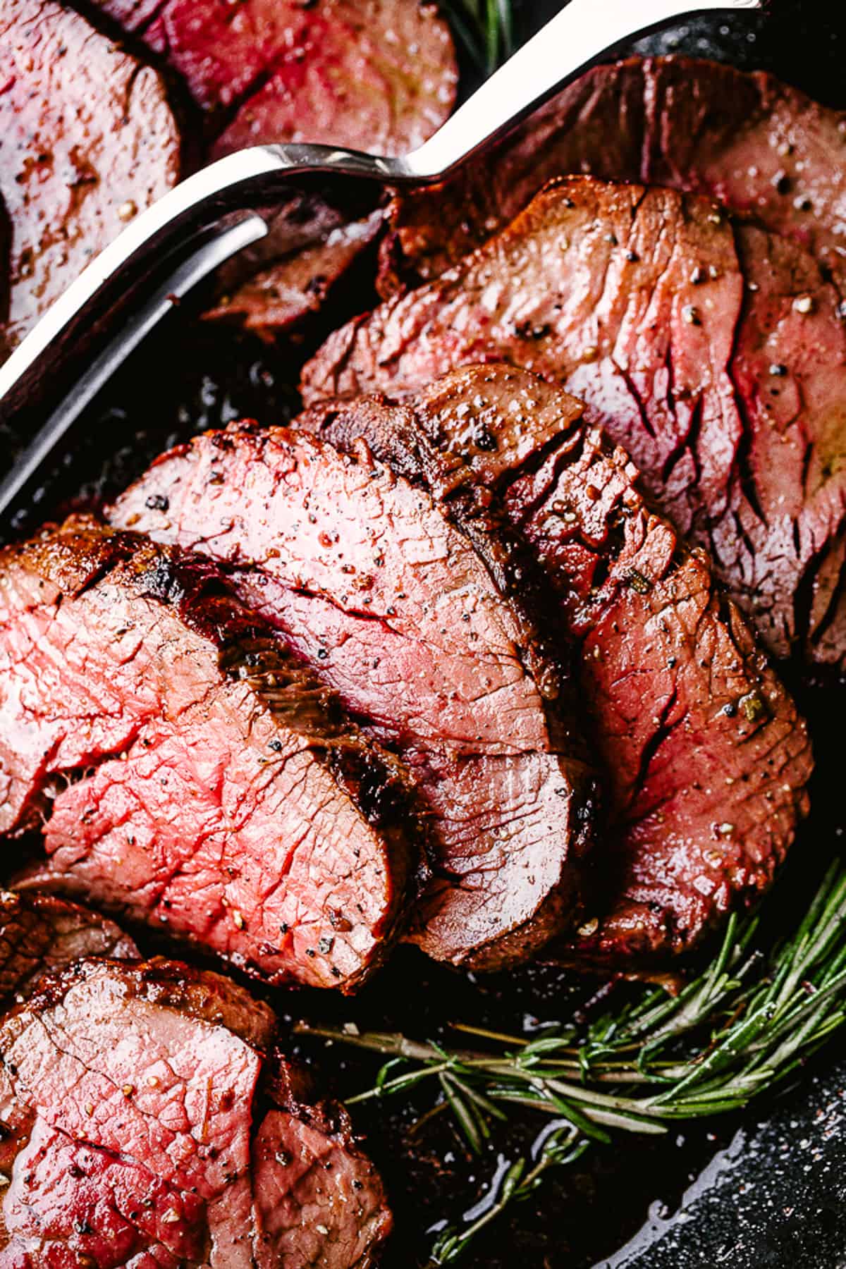 Close-up photo of slices of roast beef.