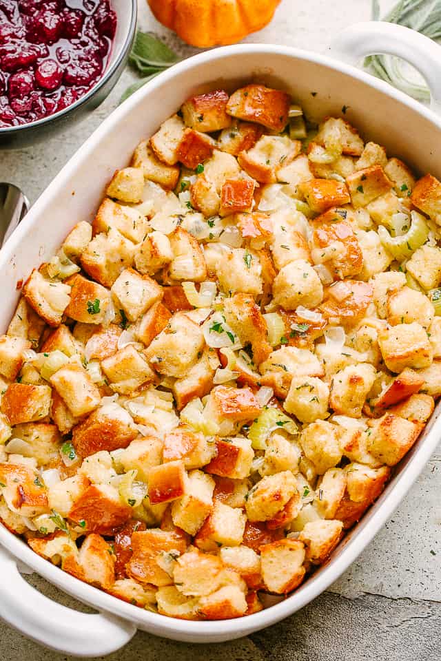 A casserole dish full of traditional Thanksgiving stuffing.