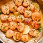 scallops cooked in a skillet with garlic, butter, and lemon juice