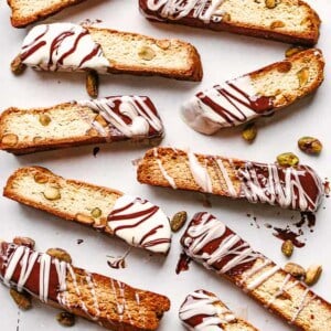 pistachio biscotti arranged on a parchment paper