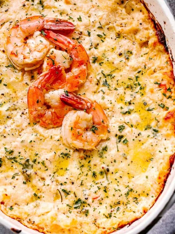 baked shrimp dip topped with cooked shrimp