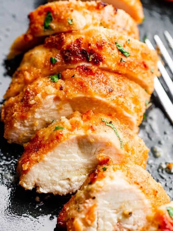 Sliced chicken breast served on a dinner plate.