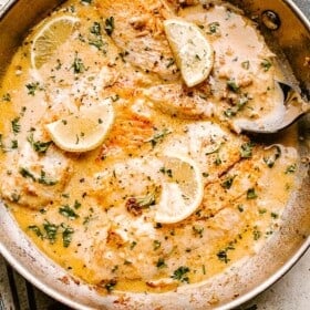 Skillet with creamy tilapia