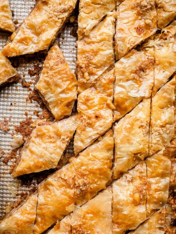 Slices of baklava on a baking sheet