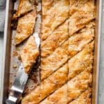 cut up baklava in a pan
