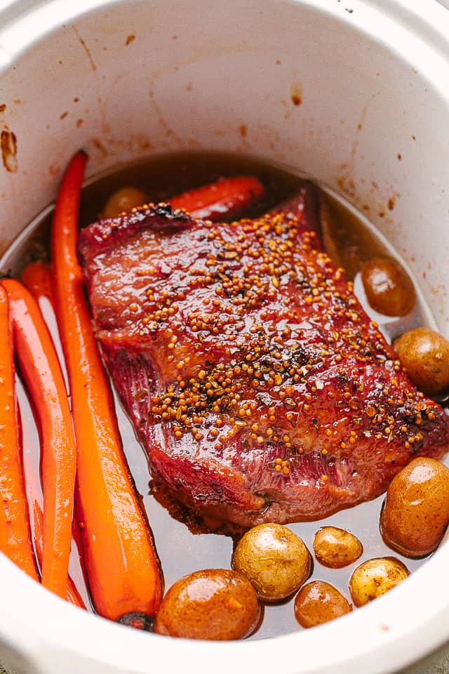 Corned beef in the crock pot with potatoes and carrots