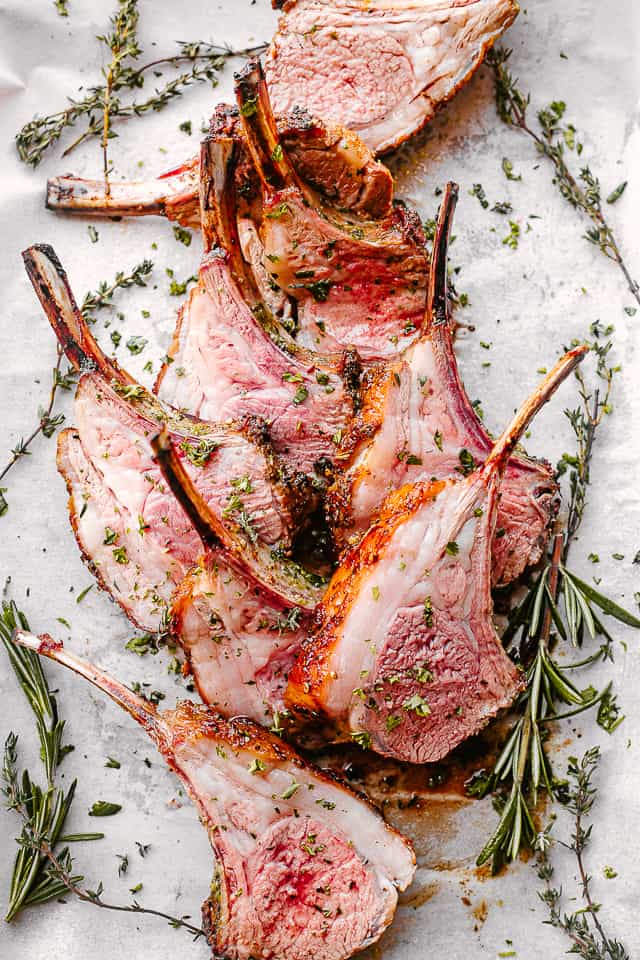 Roasted rack of lamb sliced into cutlets and garnished with fresh rosemary.