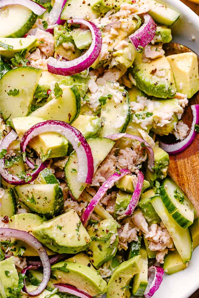salad mix with tuna, cucumbers, and avocado