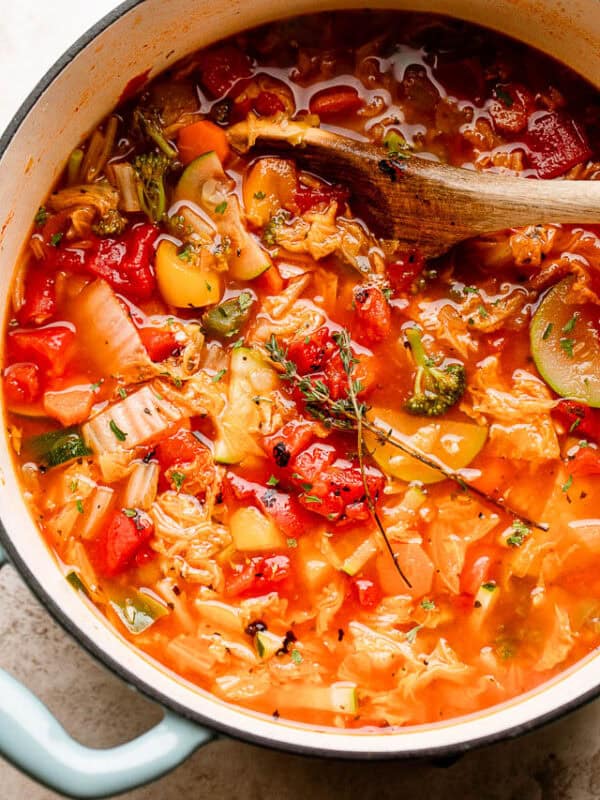Cabbage soup simmering in a pot.