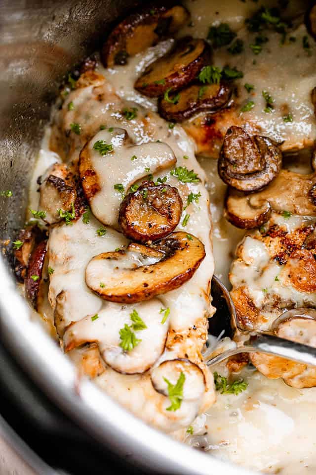 chicken marsala topped with creamy sauce and mushrooms