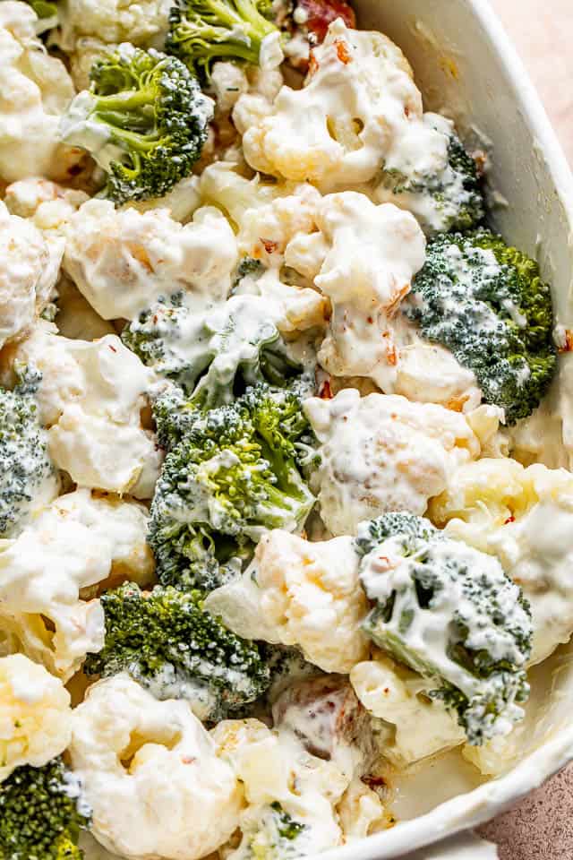 broccoli and cauliflower florets covered in a creamy cheese mixture