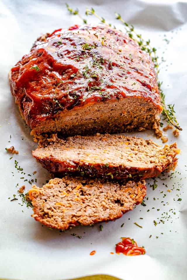 side shot of a whole sliced meatloaf cooked in instant pot