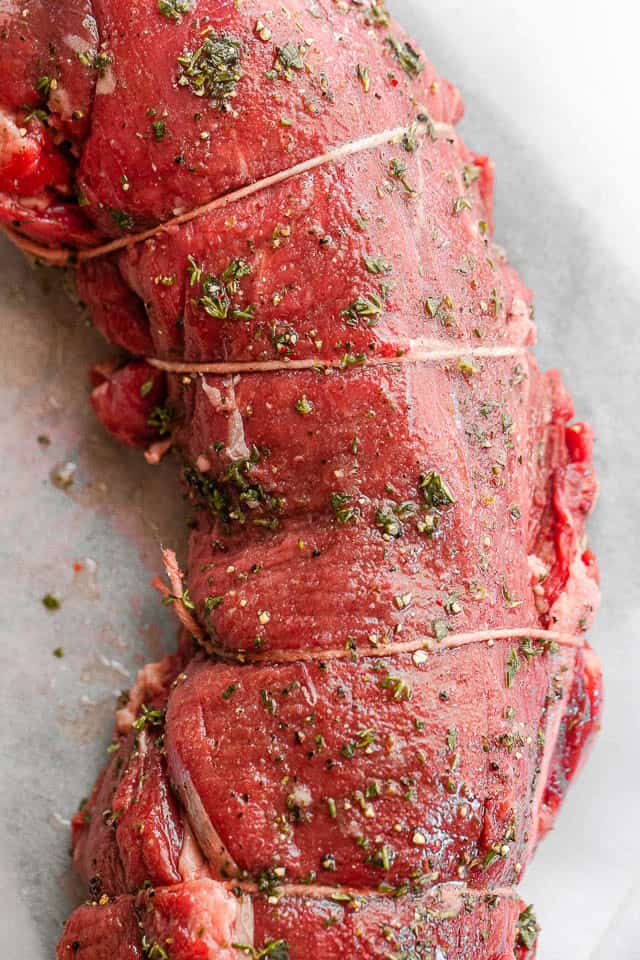 Make the most of your holiday meal with roasted beef tenderloin and homemade mushroom gravy. Simple, flavorful, and perfect for special occasions. Raw tenderloin prepped with twine.