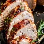 Pressure cooked pork tenderloin cut into slices.