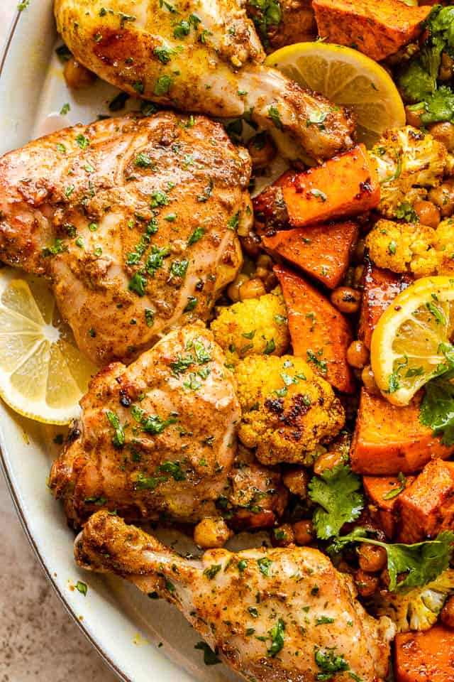 close up shot of tandoori chicken served with vegetables