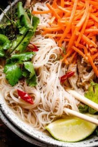 close up overhead shot of instant pot chicken pho in a bowl