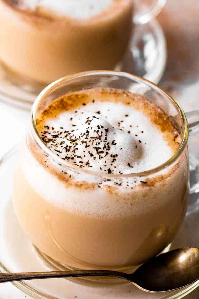 side close up shot of london fog tea latte in glass mug