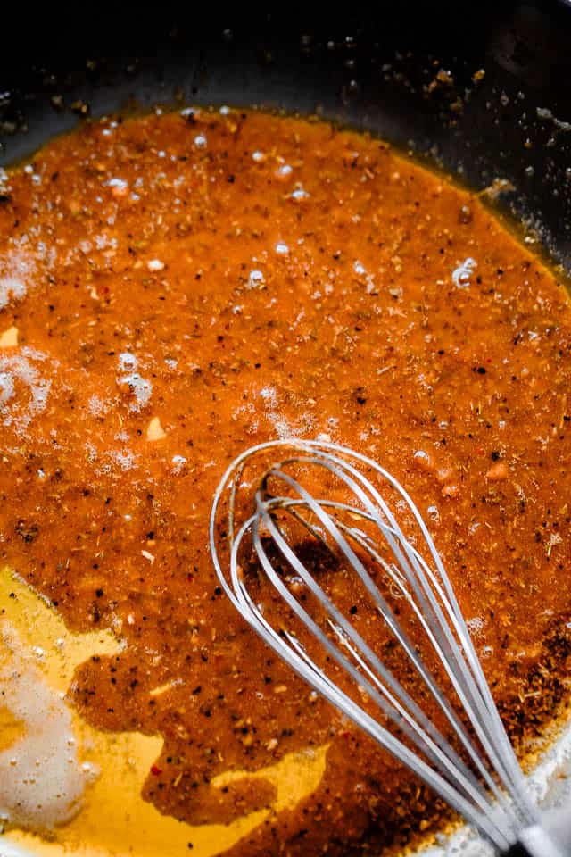 prepping cajun butter sauce in a skillet