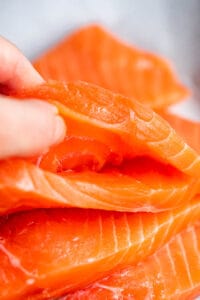 raw salmon fillets with pockets