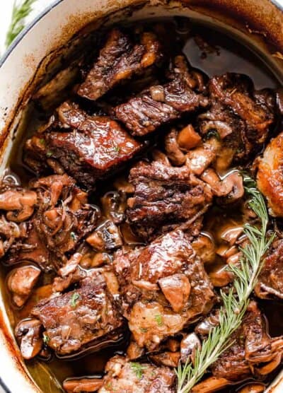 overhead shot of red wine braised beef short ribs in a slow cooker