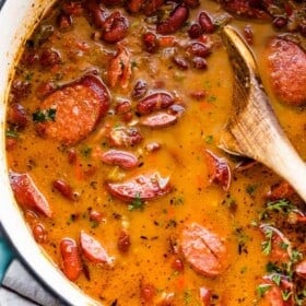 cooked red beans and sausage in a dutch oven