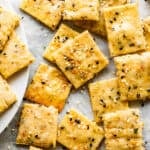 close up picture of homemade crackers topped with everything bagel seasoning
