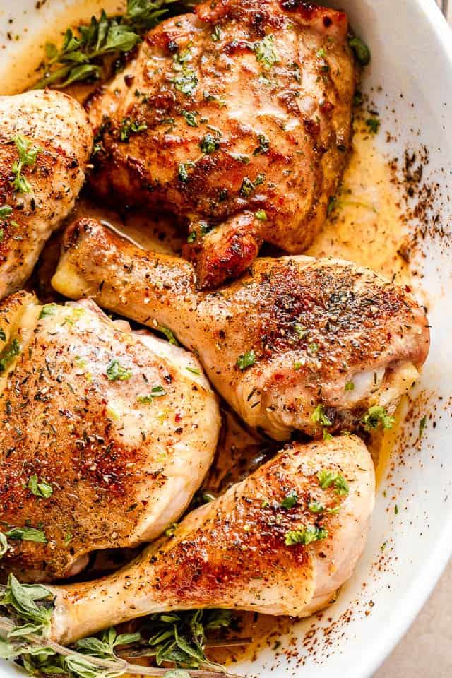 overhead shot of crispy baked chicken drumsticks and chicken thighs