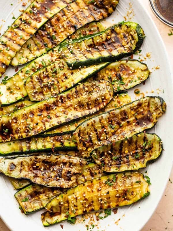 grilled zucchini slices served on an oval serving plate