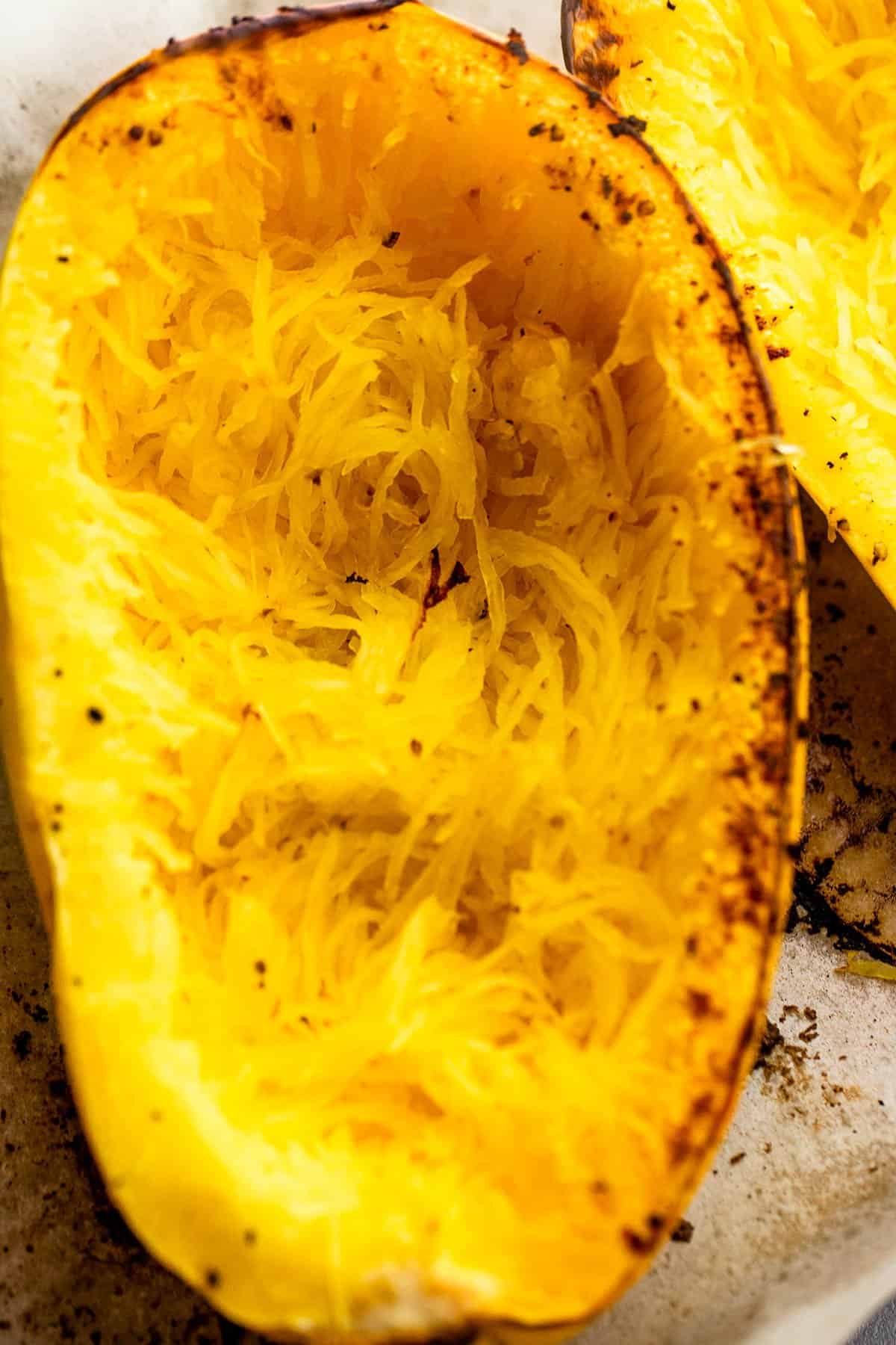 halved spaghetti squash with stringy insides