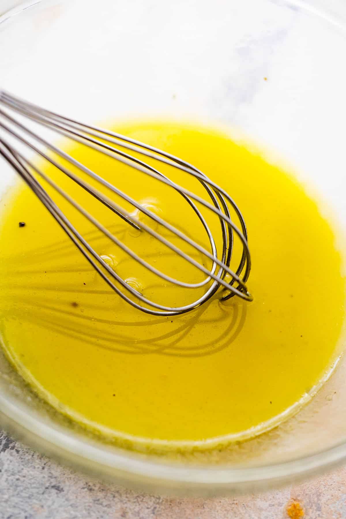 whisking dressing for a salad
