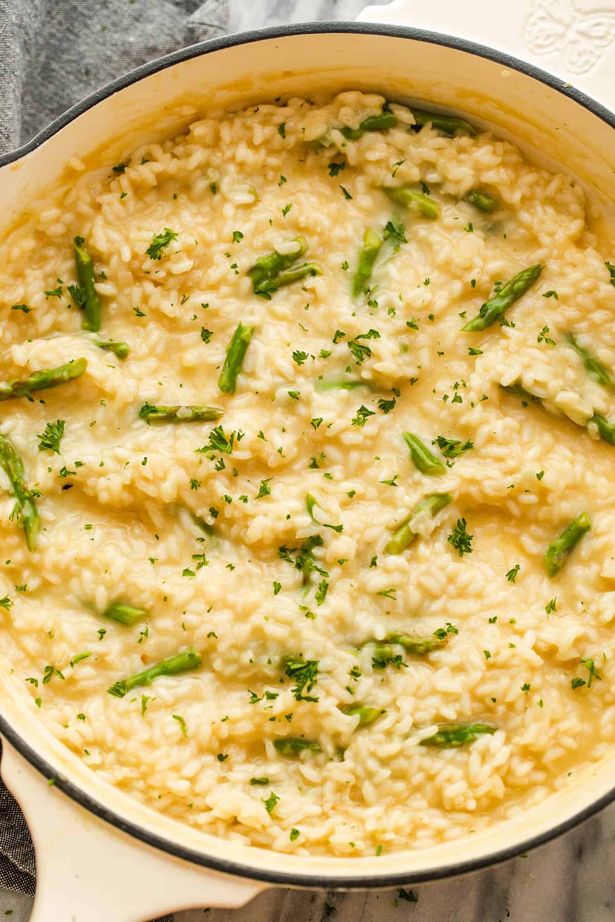 Cooking risotto in a skillet.