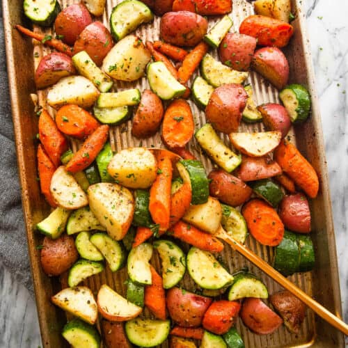 baking pan with roasted potatoes, carrots, and zucchini