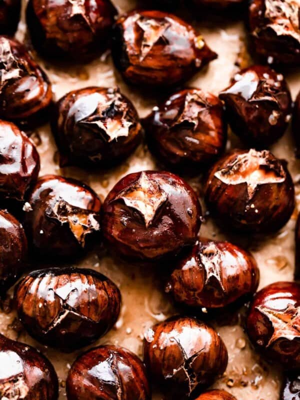 roasted chestnuts on a brown background