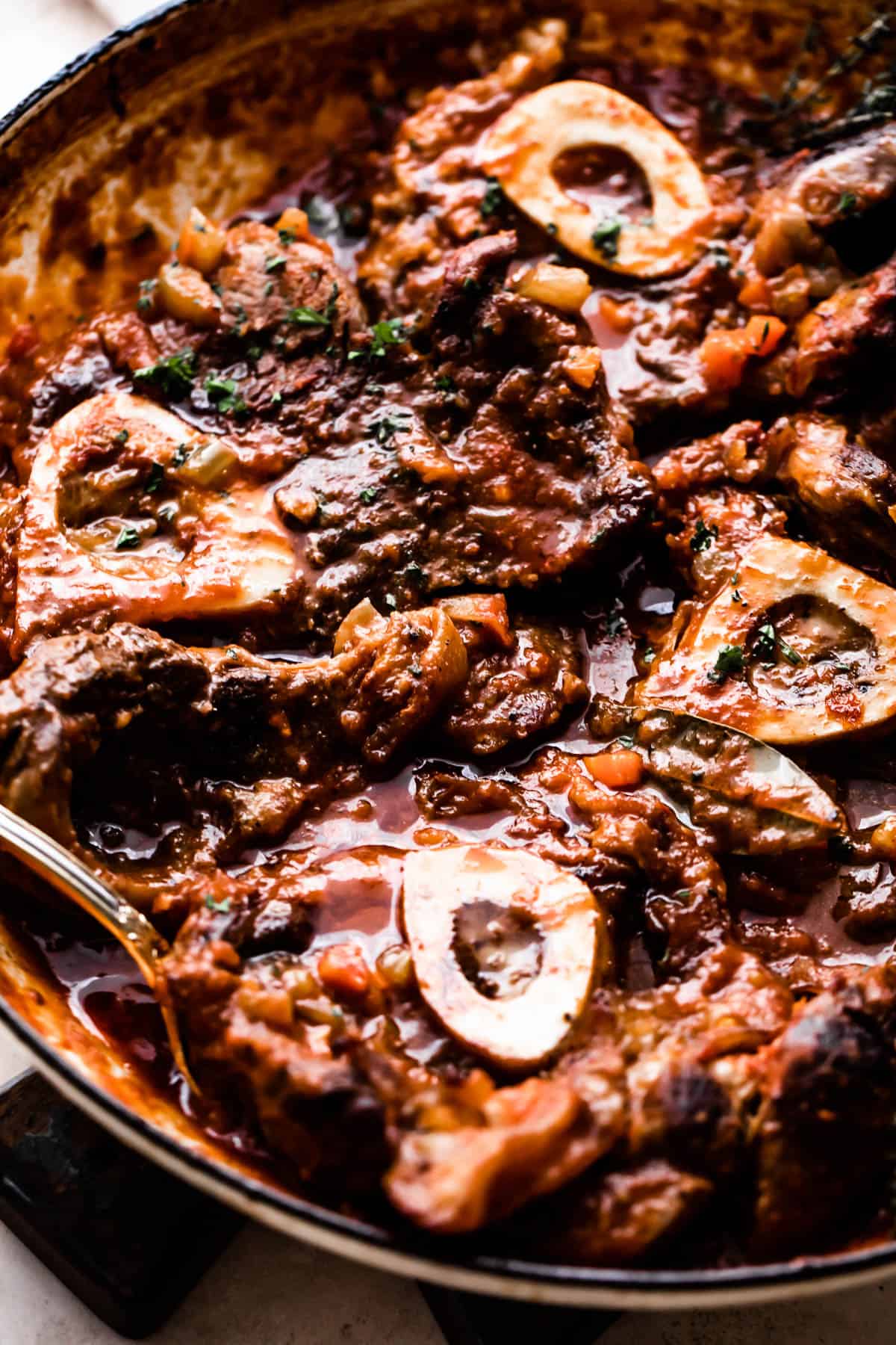 osso buco beef shanks cooked in a braiser.