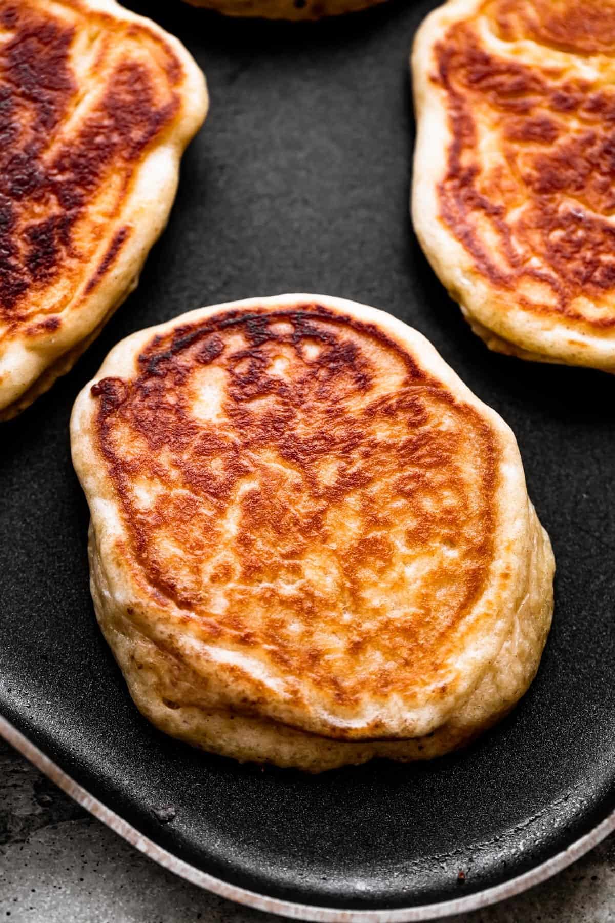 cooked drop scones on a pancake pan.