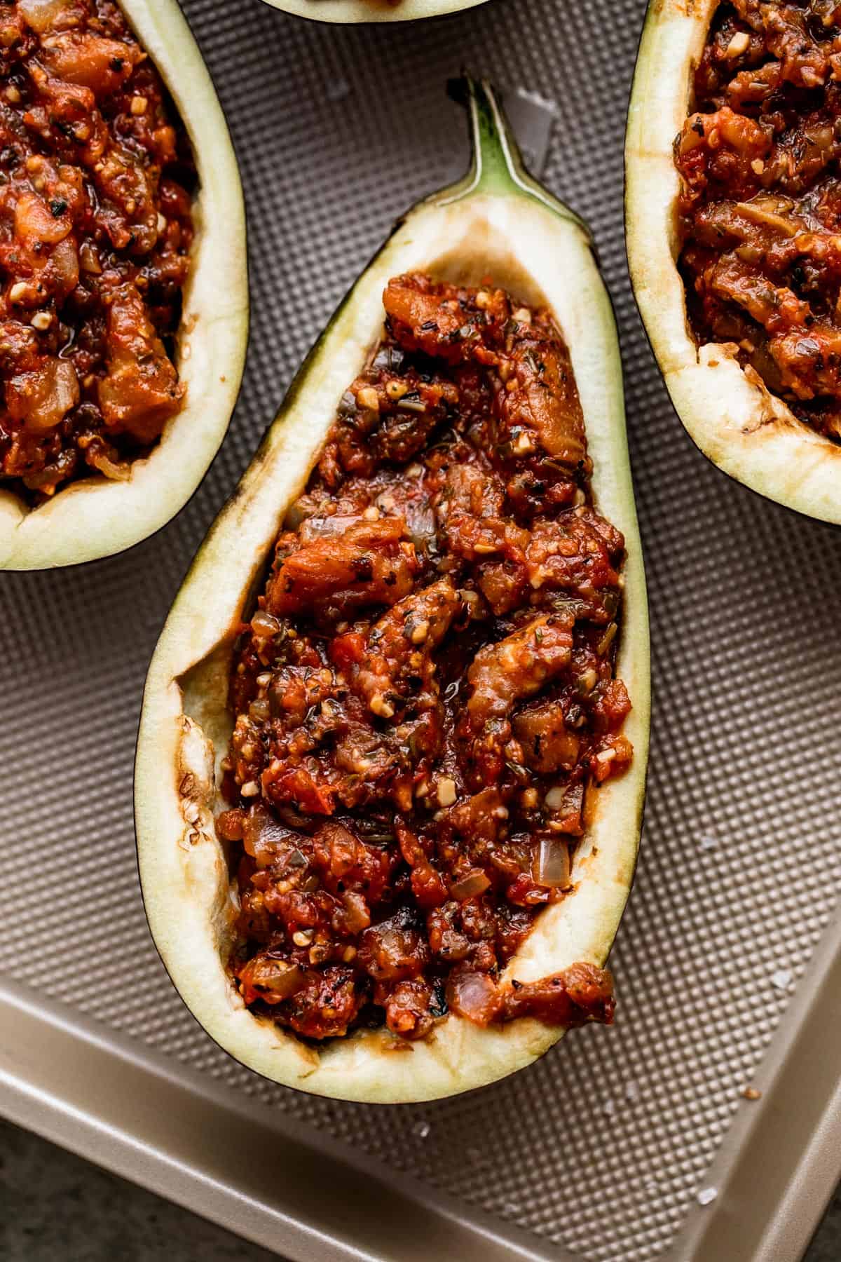 eggplant halves stuffed with a tomato base filling.
