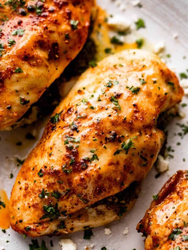 overhead close up shot of three air fryer chicken breasts.