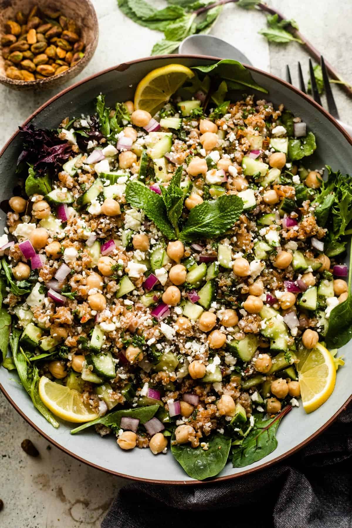 overhead shot of a serving salad bowl with bulgur salad.