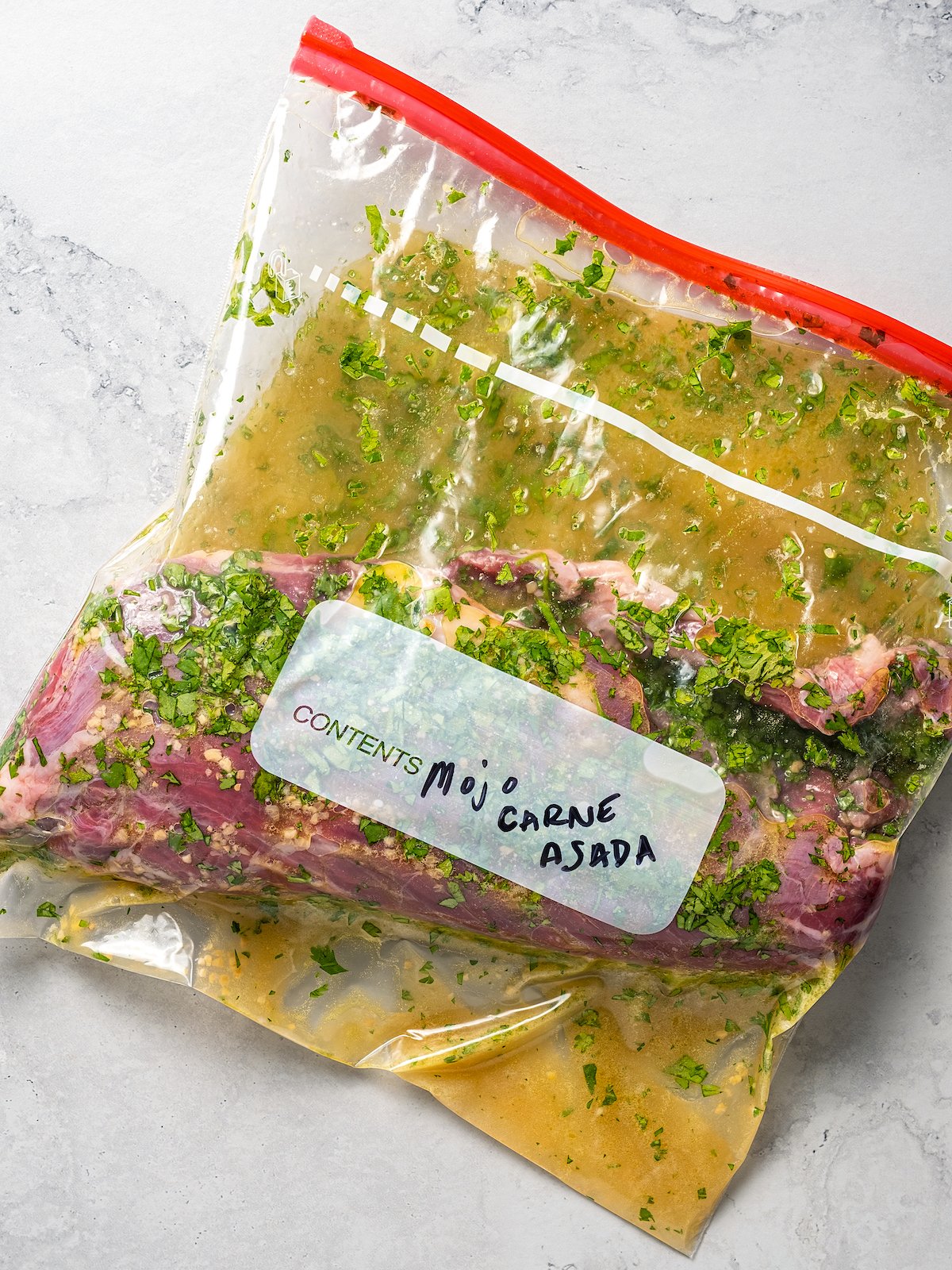 Ziplock plastic bag with steak marinating