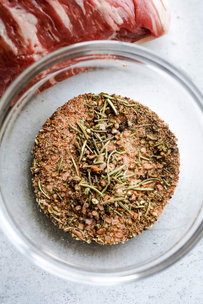 Beef seasoning in a glass mixing bowl.