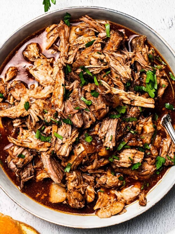 overhead shot of a large bowl of pulled pork.