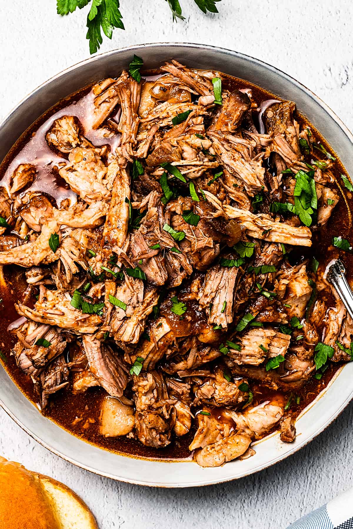 overhead shot of a large bowl of pulled pork.