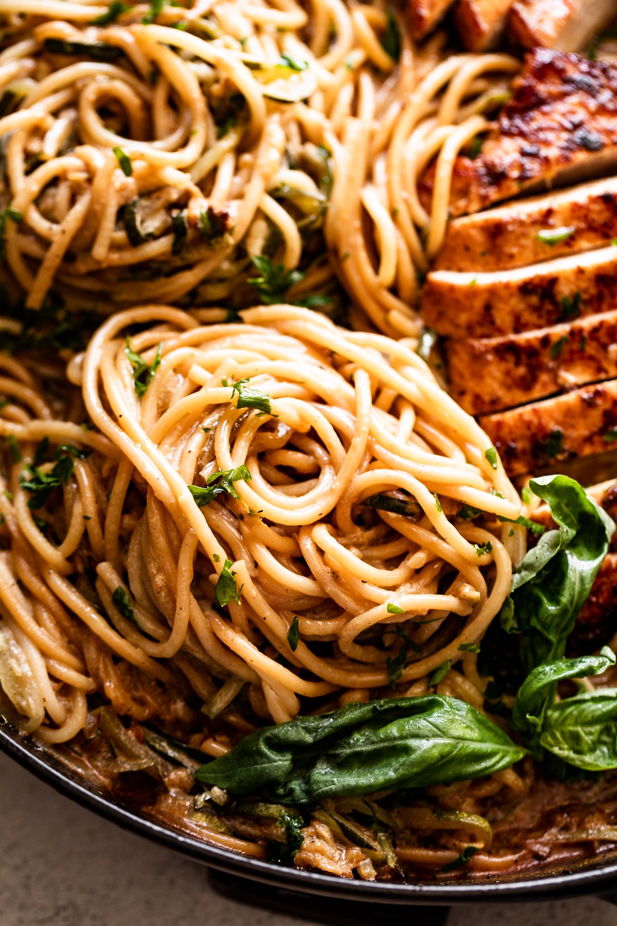 close up shot of two zucchini noodle nests.