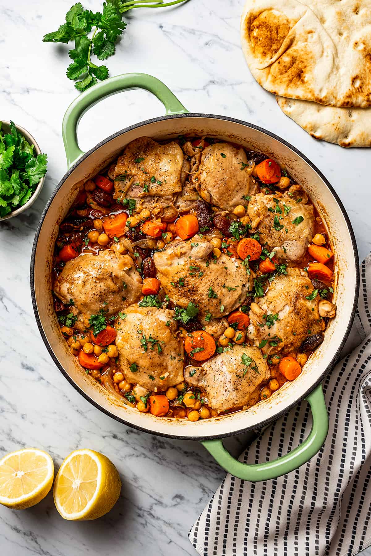 A double-handled skillet of Moroccan chicken.