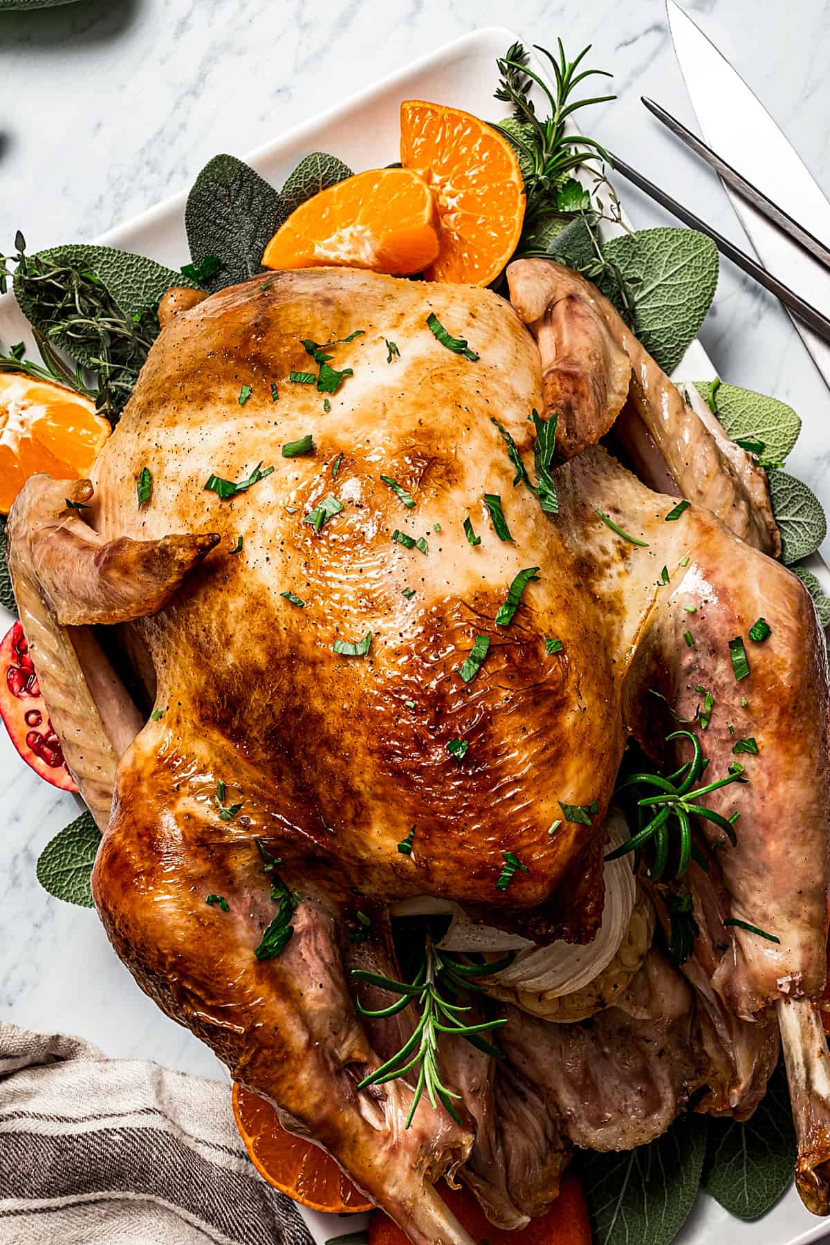 Easy roasted turkey made with garlic, fresh herbs, and butter.